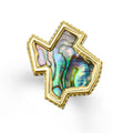 Intricately crafted abalone gemstone and 18K gold in a Texas motif shape surrounded by sterling silver forms this statement ring. Perfect for a bold look.