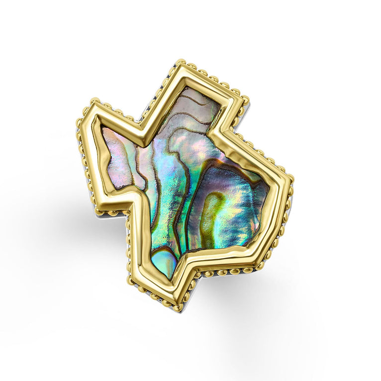 Intricately crafted abalone gemstone and 18K gold in a Texas motif shape surrounded by sterling silver forms this statement ring. Perfect for a bold look.