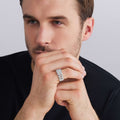Man wearing Caviar beaded sterling silver ring with pavé diamonds, 12 mm band