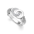 Signature Caviar Medium Silver Interlocking Diamond Ring with overlapping loops, one pave-set with clear stones. Sterling silver band features a beaded texture, symbolizing unity and elegance.