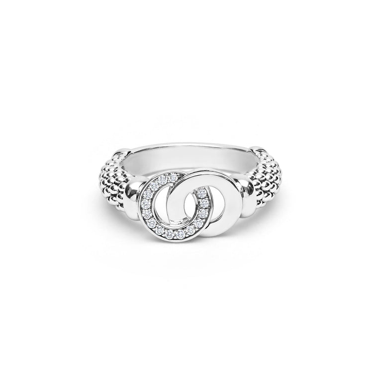 Signature Caviar Medium Silver Interlocking Diamond Ring features a spherical band and interlocking diamond-paved motifs, symbolizing unity and elegance in sterling silver.