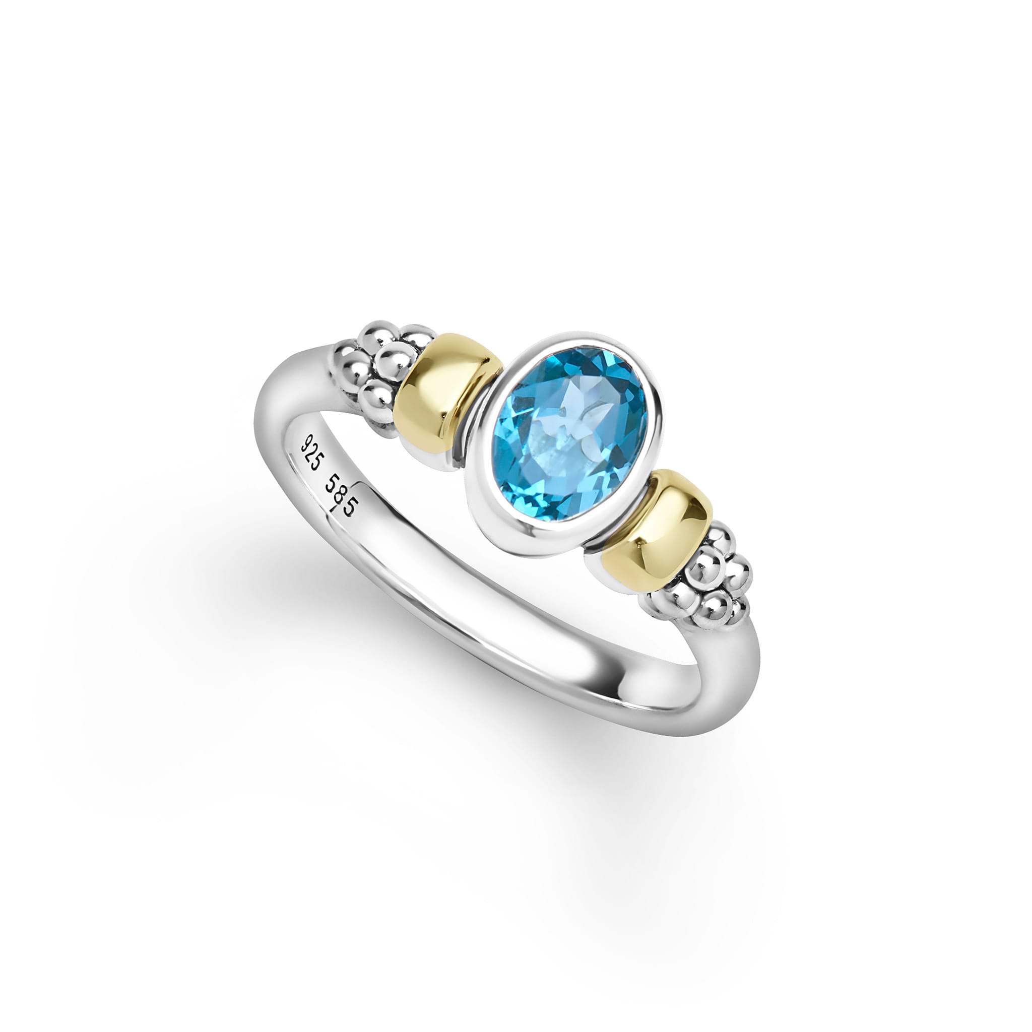 Signature Caviar Two-Tone Swiss Blue Topaz Oval Ring in sterling silver, featuring 14K gold caviar beading and a bezel-set oval Swiss blue topaz gemstone.