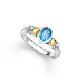 Signature Caviar Two-Tone Swiss Blue Topaz Oval Ring in sterling silver, featuring 14K gold caviar beading and a bezel-set oval Swiss blue topaz gemstone.