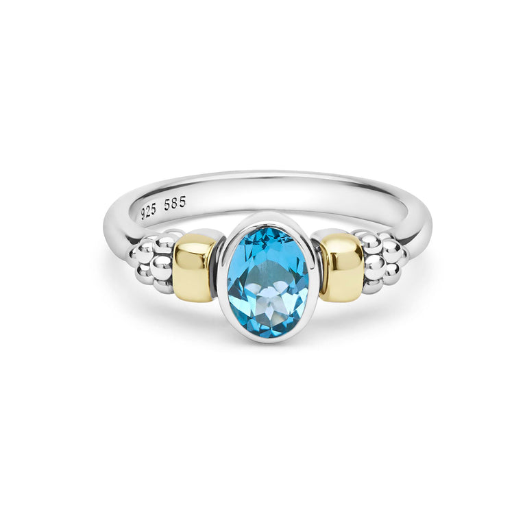 Signature Caviar Two-Tone Swiss Blue Topaz Oval Ring in sterling silver with 14K gold accents, featuring a pear-cut blue topaz and caviar beading.