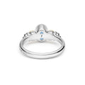 Signature Caviar Two-Tone Swiss Blue Topaz Oval Ring featuring sterling silver caviar beading, 14K gold accents, and a vivid oval Swiss blue topaz gemstone.