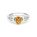 Signature Caviar Two-Tone Citrine Oval Ring featuring a polished sterling silver band, 14K gold accents, and a central oval citrine, enhanced by decorative caviar beading.