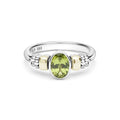 Signature Caviar Two-Tone Peridot Oval Ring in sterling silver with 14K gold accents, featuring a peridot-colored gemstone and caviar beading details.