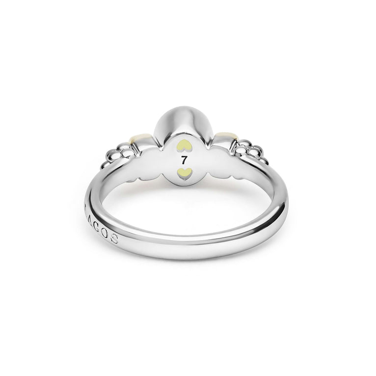 Signature Caviar Two-Tone Peridot Oval Ring in sterling silver, featuring caviar beading, 14K gold accents, and a faceted peridot gemstone.