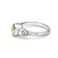 Signature Caviar Two-Tone Peridot Oval Ring featuring a bezel-set green gemstone on a sterling silver band with 14K gold accents and caviar beading.