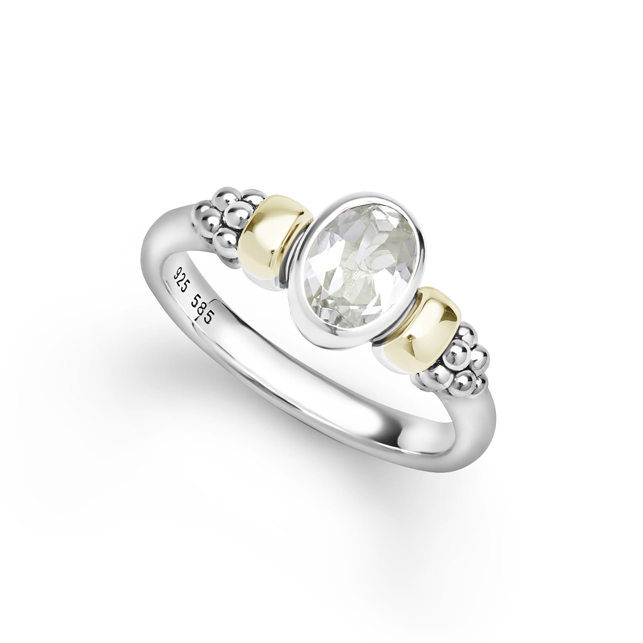 Signature Caviar Two-Tone White Topaz Oval Ring features sterling silver with caviar beading, accented by 14K gold and a faceted white topaz gemstone.