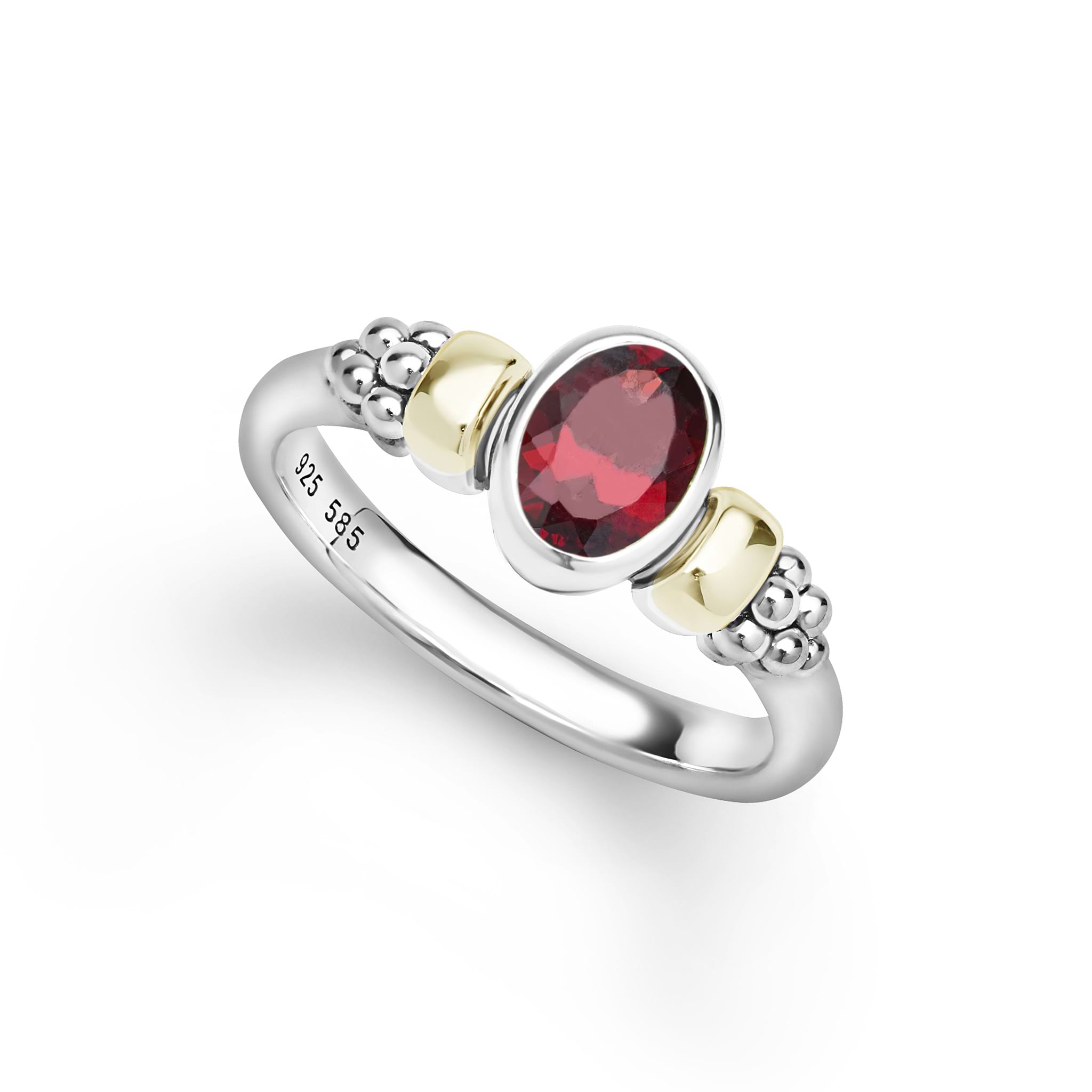 Signature Caviar Two-Tone Garnet Oval Ring features a sterling silver band with caviar beading and 14K gold accents, showcasing a striking oval garnet gemstone.
