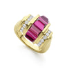 Round diamonds and rhodolite garnet cabochon gemstones are set in 18k gold to form this statement ring. LAGOS diamonds are the highest quality natural stones.