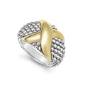 Smooth 18K gold and sterling silver Caviar beading form this statement ring.