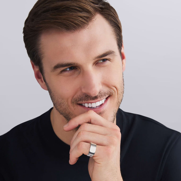 man wearing silver engravable ring with Caviar beaded design