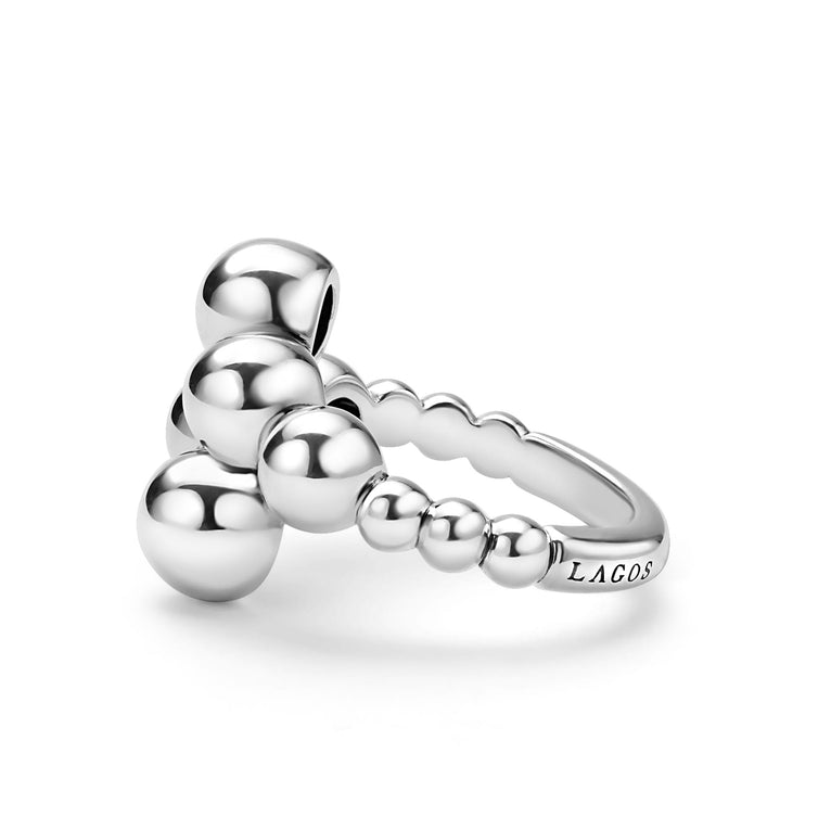 side of sterling silver ring where beads cross over with LAGOS engraving