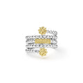  three row ring with gold and silver designs on a white background