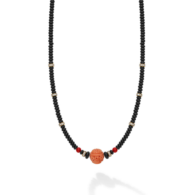 Featuring vibrant pink and red hand carved coral beads set against matte black onyx, delicate diamond accents add a touch of sparkle, making this piece perfect for any occasion.