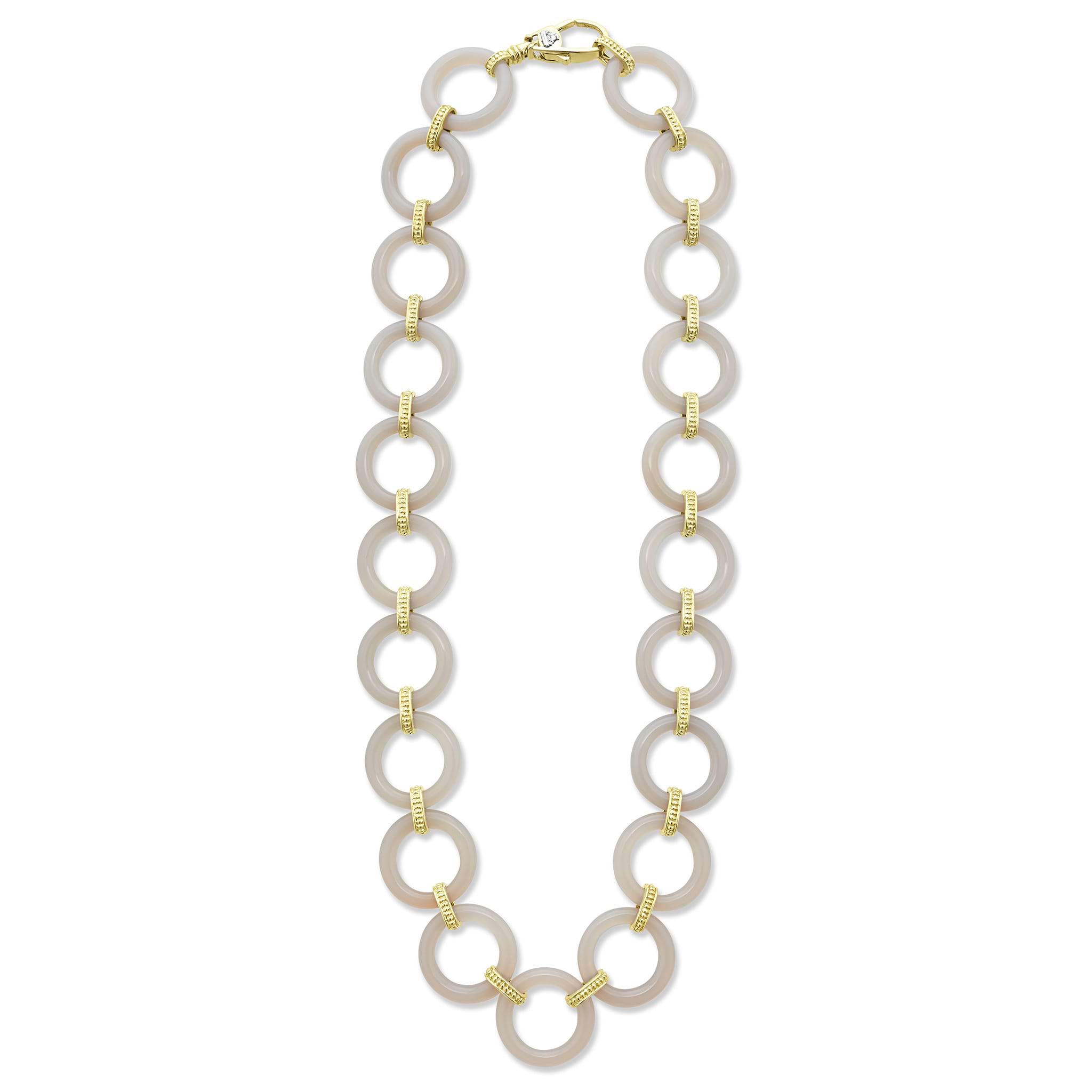 A classic necklace with 18K gold and ceramic circle details.
