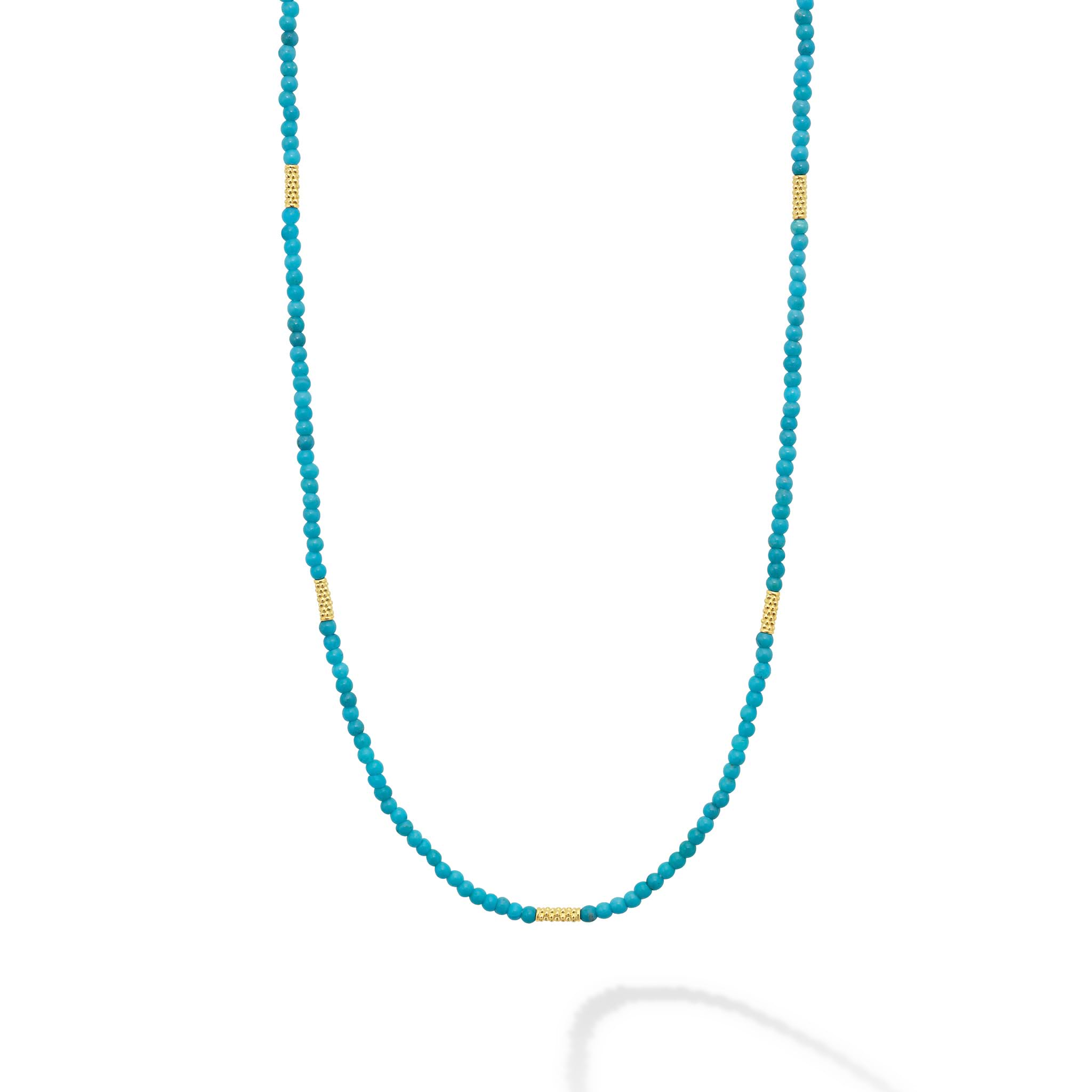 Seven 18K gold stations surrounded by Turquoise gemstone Caviar beading forms this strand necklace.