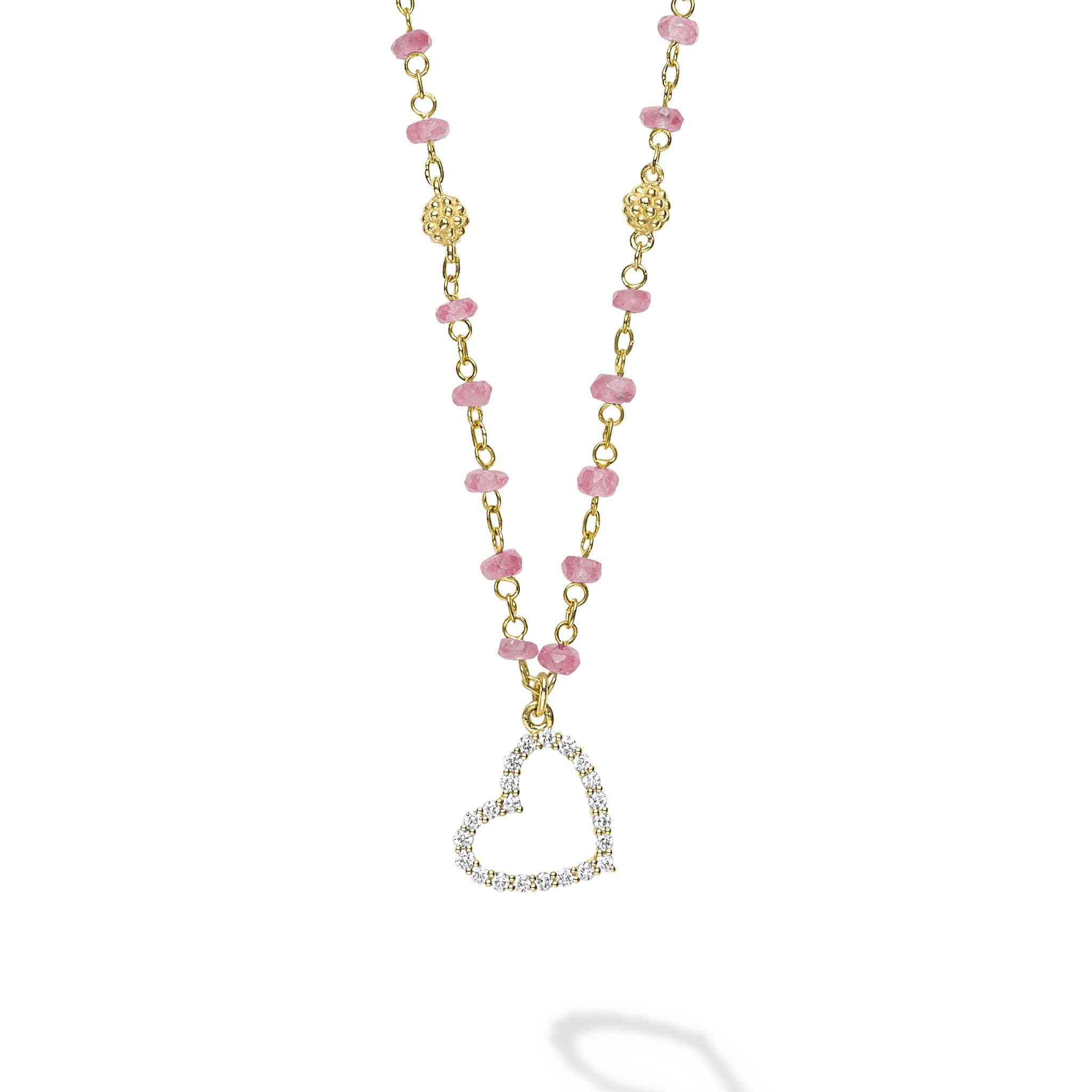 18k gold and pink sapphire gemstones accented with round diamonds in a heart motif form this pendant necklace. LAGOS diamonds are the highest quality natural stones.