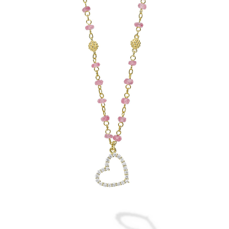 18k gold and pink sapphire gemstones accented with round diamonds in a heart motif form this pendant necklace. LAGOS diamonds are the highest quality natural stones.