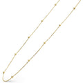 Closeup of 18K Gold Station Beaded Necklace