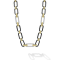 Black ceramic and 18K gold accented by three diamond stations forms this bold link necklace. LAGOS diamonds are the highest quality natural stones.