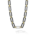 Black ceramic and 18K gold accented by a single diamond station forms this bold link necklace. LAGOS diamonds are the highest quality natural stones.