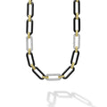 Black ceramic and 18K gold accented by three diamond stations forms this bold link necklace. LAGOS diamonds are the highest quality natural stones.