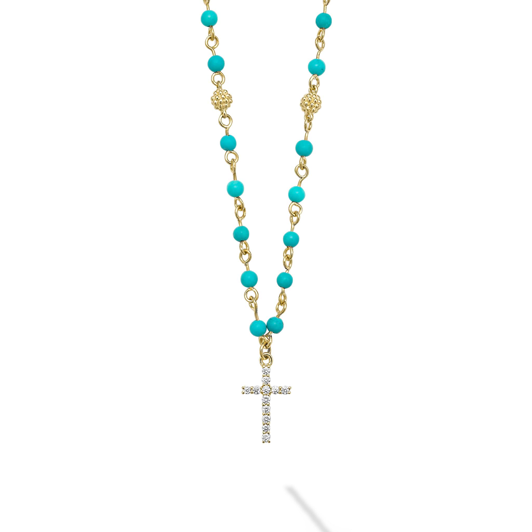 18k gold and turquoise gemstones accented with round diamonds in a cross motif form this pendant necklace. LAGOS diamonds are the highest quality natural stones.