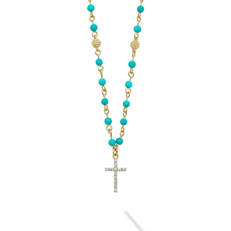 18k gold and turquoise gemstones accented with round diamonds in a cross motif form this pendant necklace. LAGOS diamonds are the highest quality natural stones.