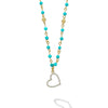 18k gold and black turquoise gemstones accented with round diamonds in a heart motif form this pendant necklace. LAGOS diamonds are the highest quality natural stones.