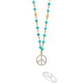 18k gold and black turquoise gemstones accented with round diamonds in a peace sign motif form this pendant necklace. LAGOS diamonds are the highest quality natural stones.