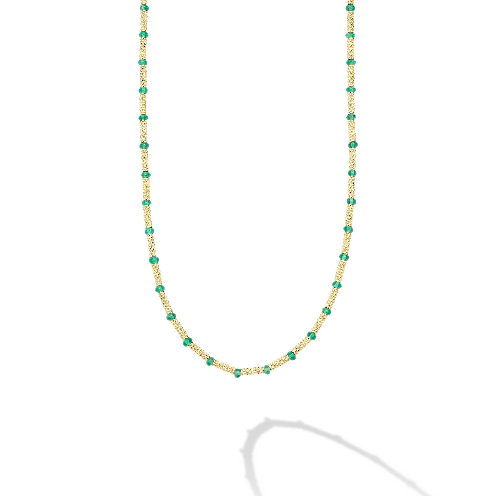 Emerald gemstones and Caviar beaded 18k gold stations for this timeless necklace.