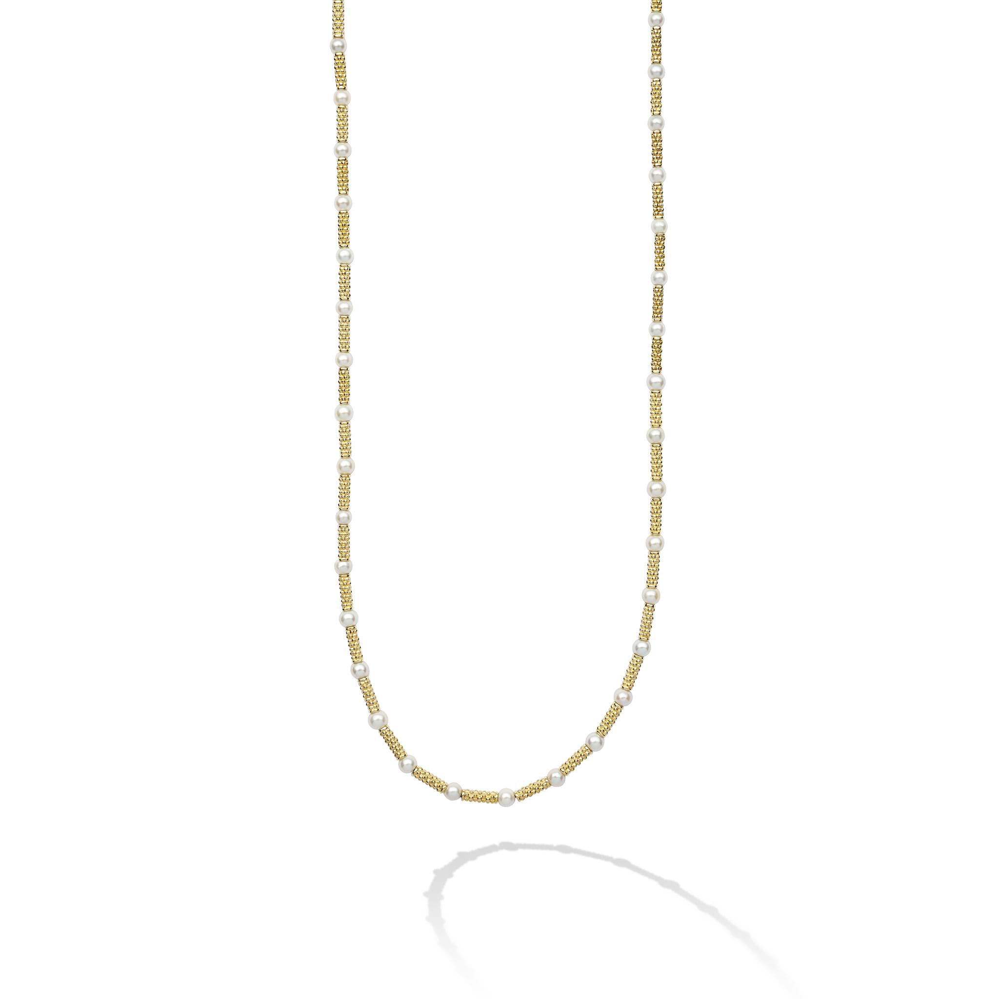 This exquisite 18K gold necklaces features signature Caviar beading and luxurious freshwater cultured pearls.