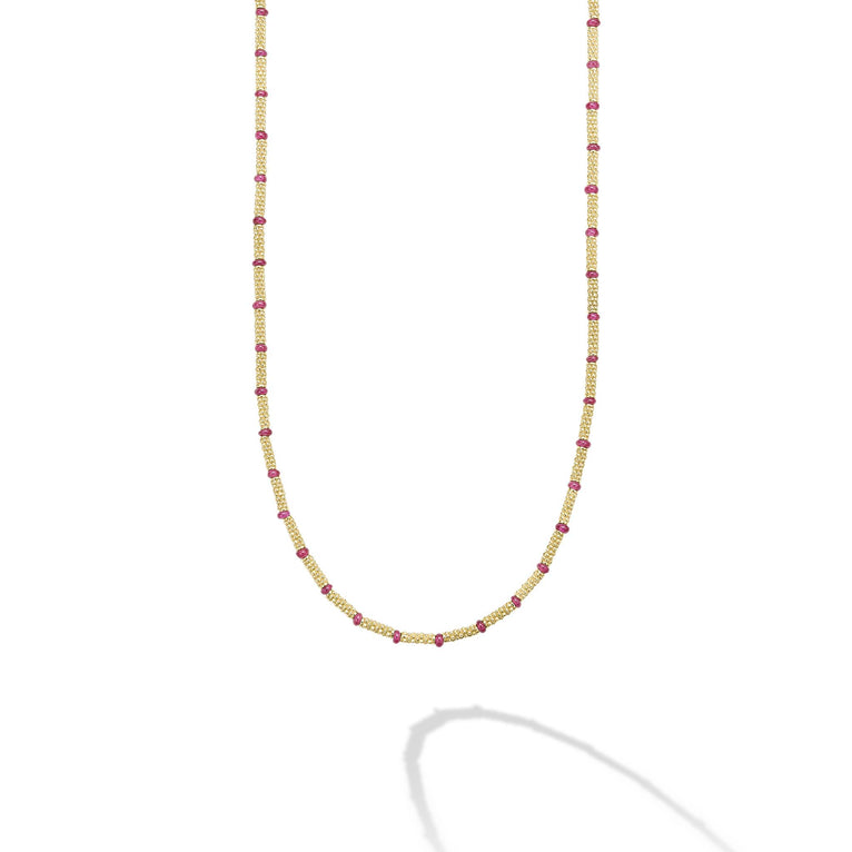 Ruby gemstones and Caviar beaded 18k gold stations for this timeless necklace.