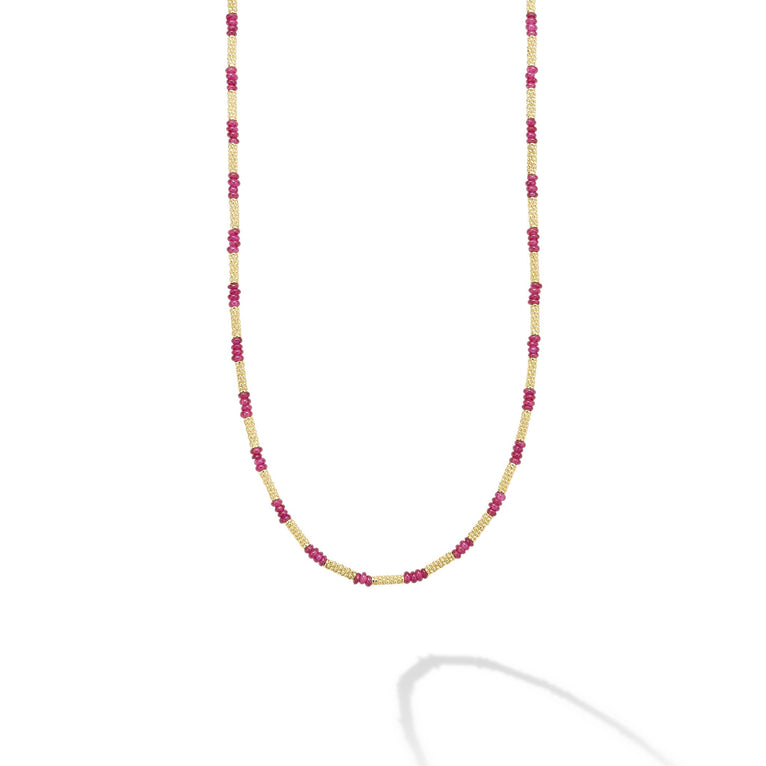 Ruby gemstones and Caviar beaded 18k gold stations for this timeless necklace.