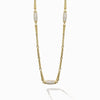 This 18K Caviar Gold Necklace features three barrel stations, adorned in brilliant diamonds.