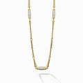 This 18K Caviar Gold Necklace features three barrel stations, adorned in brilliant diamonds.