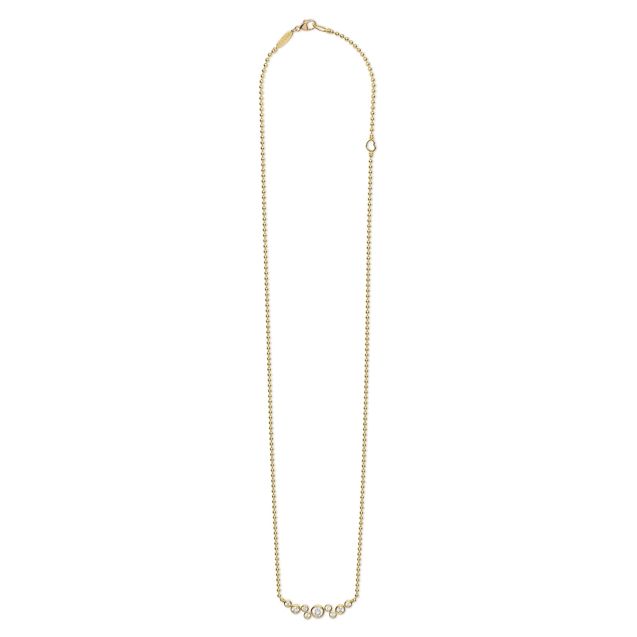 Nine bezel-cut diamond horizonal pendant on a 18K gold beaded chain with clasp on white background