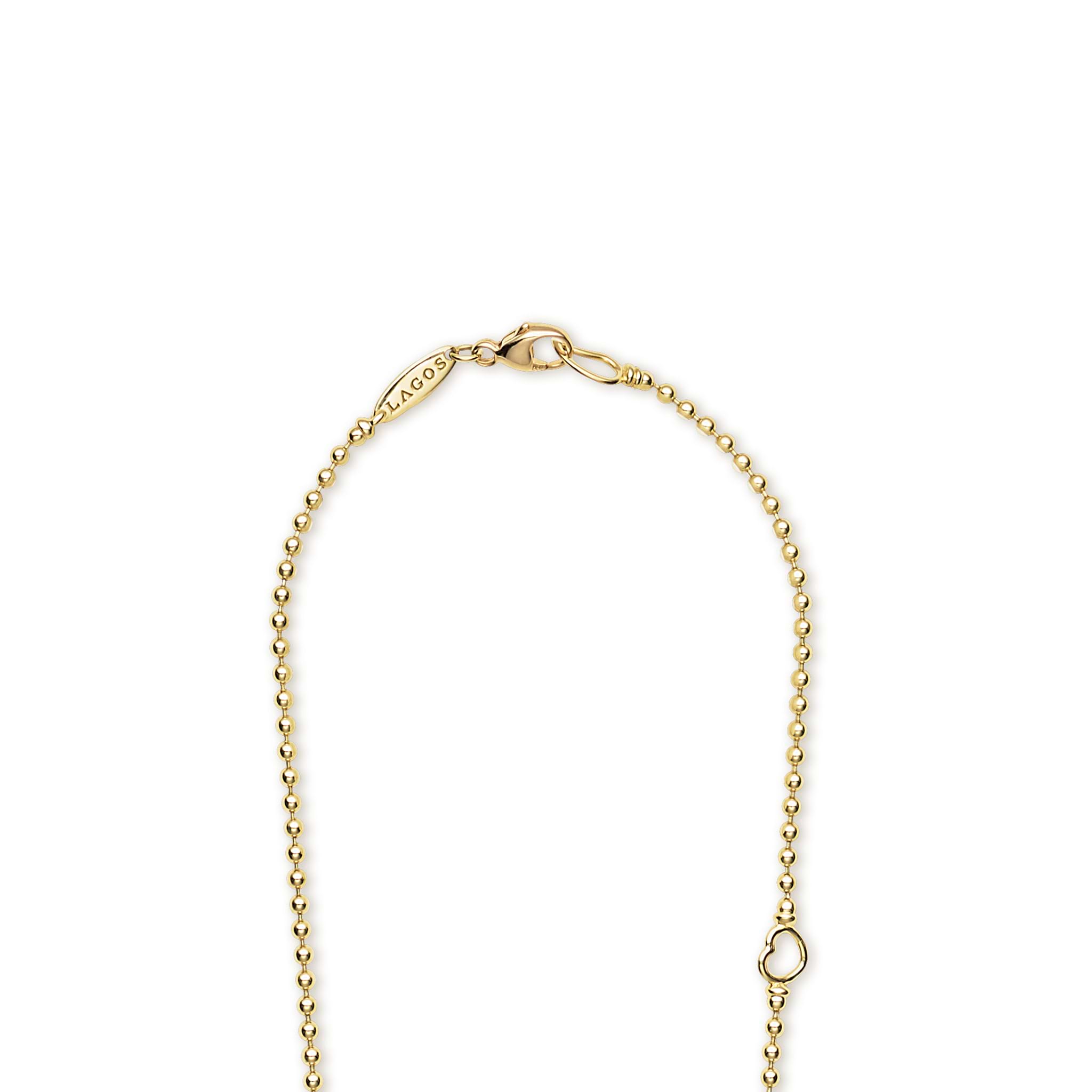 18K gold beaded necklace with lobster clasp and LAGOS engraving on a white background