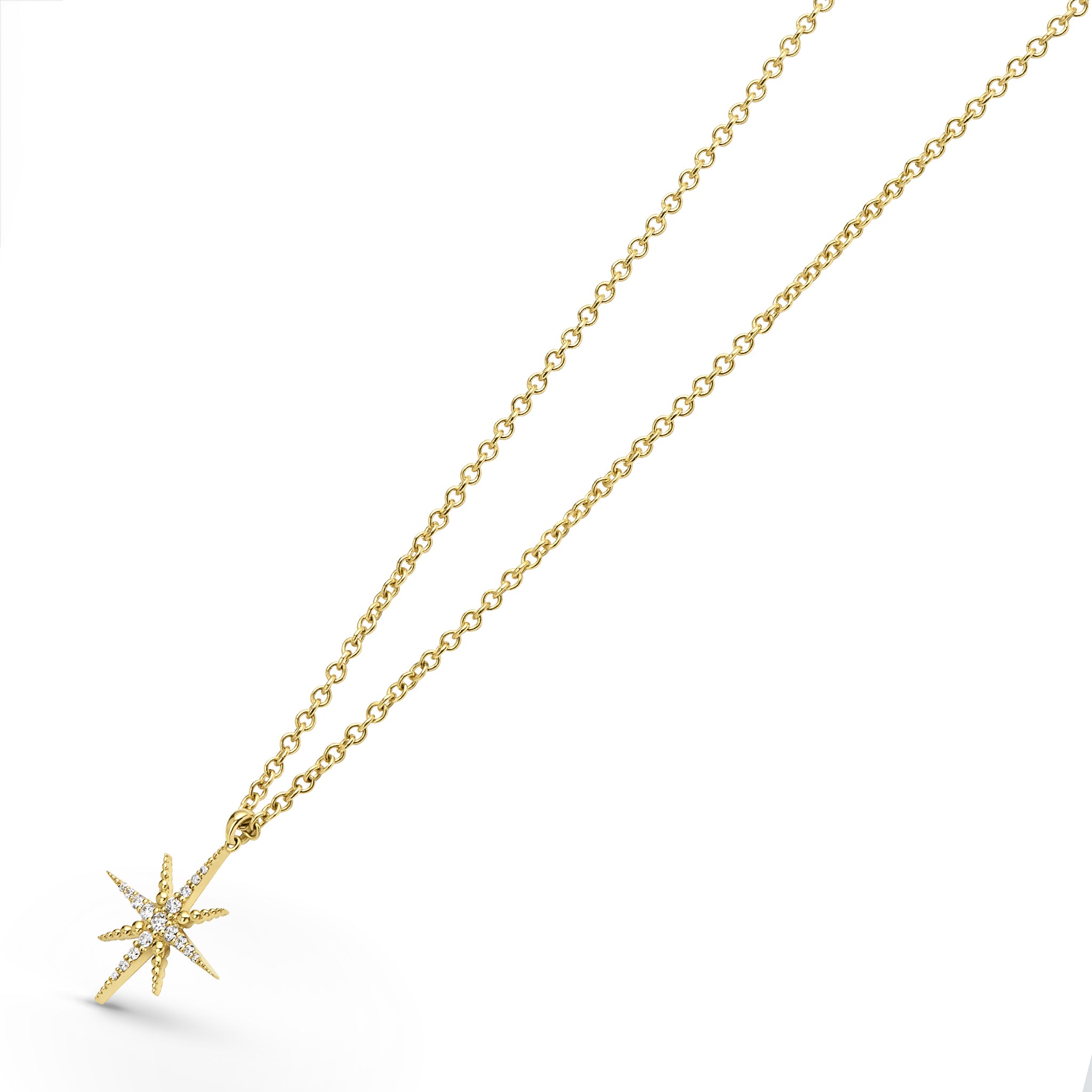 Side view of the 18K Gold Mini Diamond Star Pendant Necklace