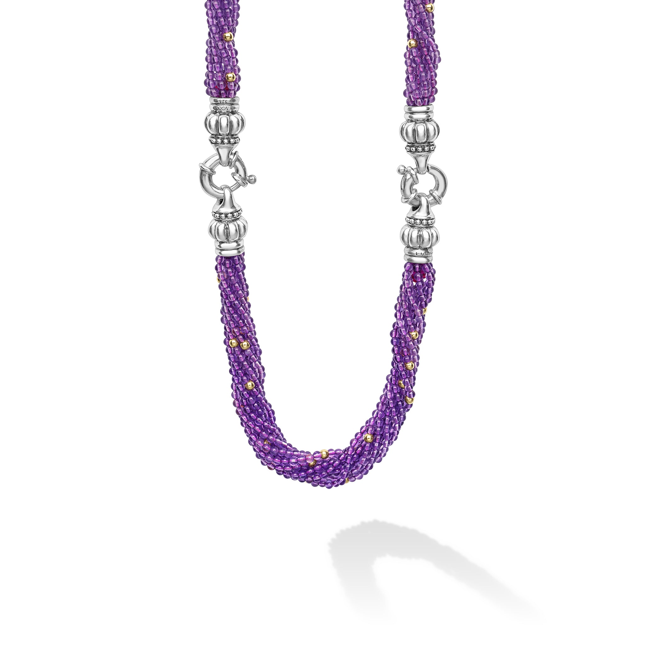 Purple beaded necklace with silver clasp on a white background