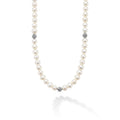 A freshwater cultured pearl necklace with sterling silver Caviar beaded accents. Finished on an 18K gold dagger toggle clasp.