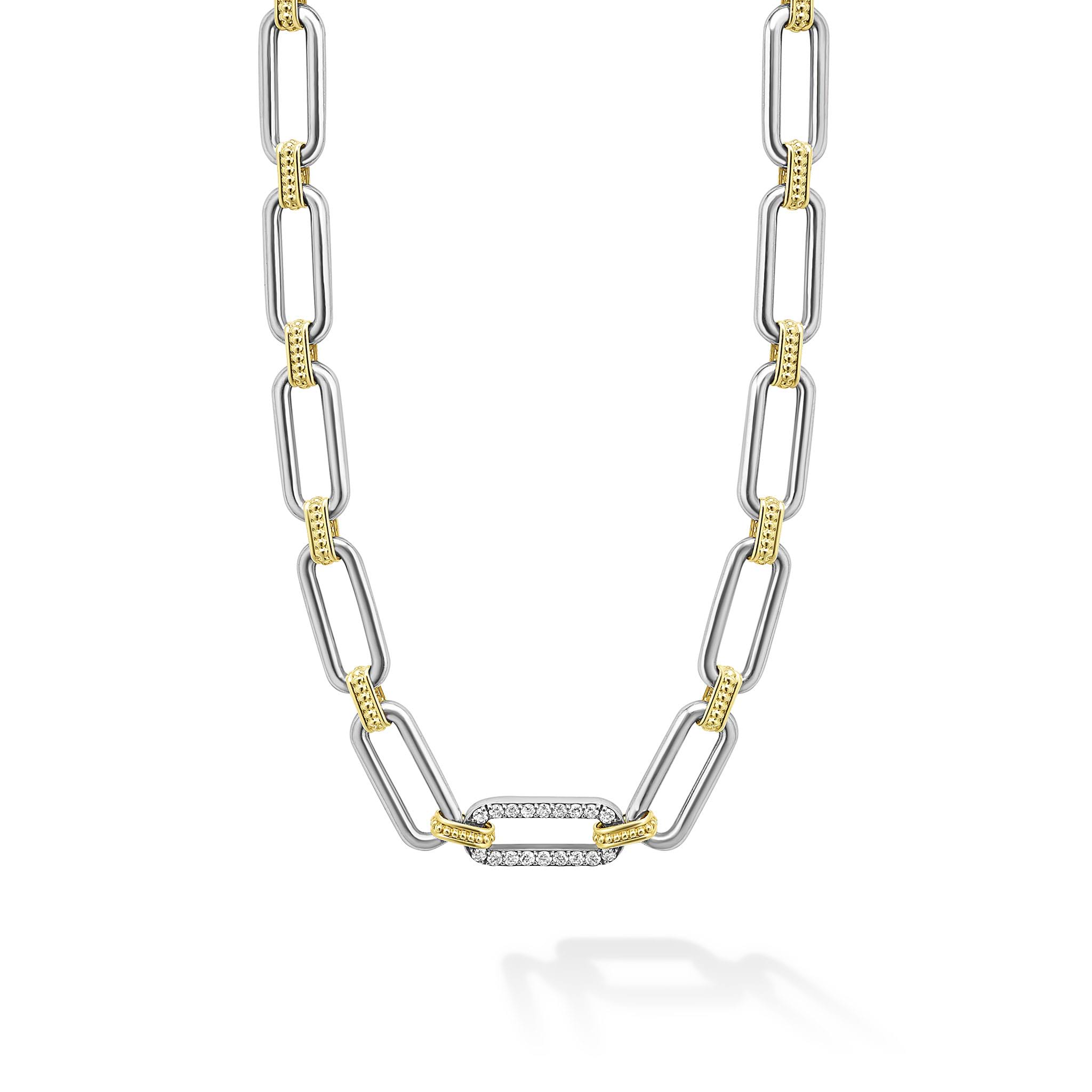 Sterling silver & 18K gold variations of Caviar beading & fluting elements accented by a single diamond station form this oval link necklace. LAGOS diamonds are the highest quality natural stones.