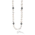 Keshi pearl stations highlighted with Caviar beaded spheres on a signature sterling silver 18 inch necklace.