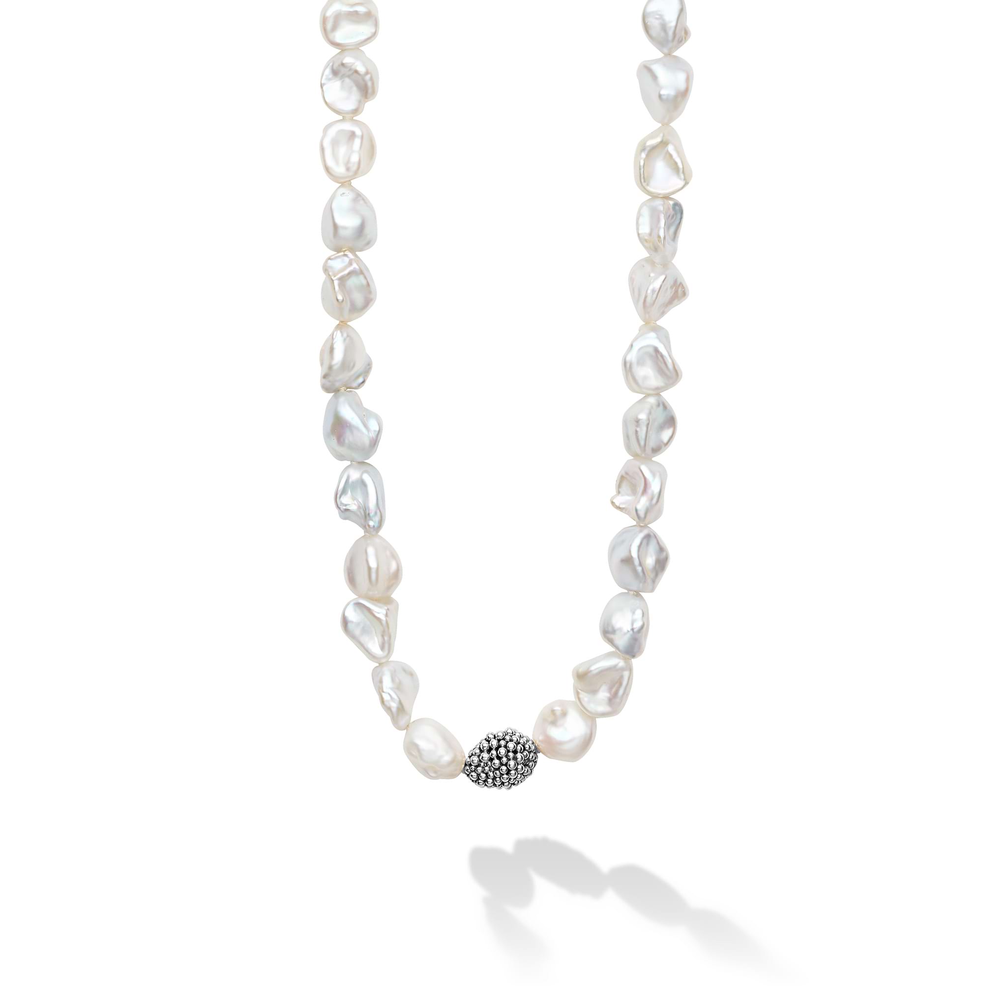 Keshi pearl stations highlighted with Caviar beaded spheres on a signature sterling silver 34 inch necklace.