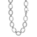Signature Caviar Sterling Silver Oval Fluted Link Necklace featuring alternating smooth and textured 18mm links, engraved with LAGOS, and a lobster-style clasp.