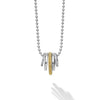 Smooth sterling silver, 18K gold superfine Caviar beading, and diamonds form five rings on a sterling silver chain. LAGOS diamonds are the highest quality natural stones.