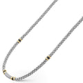 side of sterling silver beaded statement necklace with black ceramic and gold stations and diamonds
